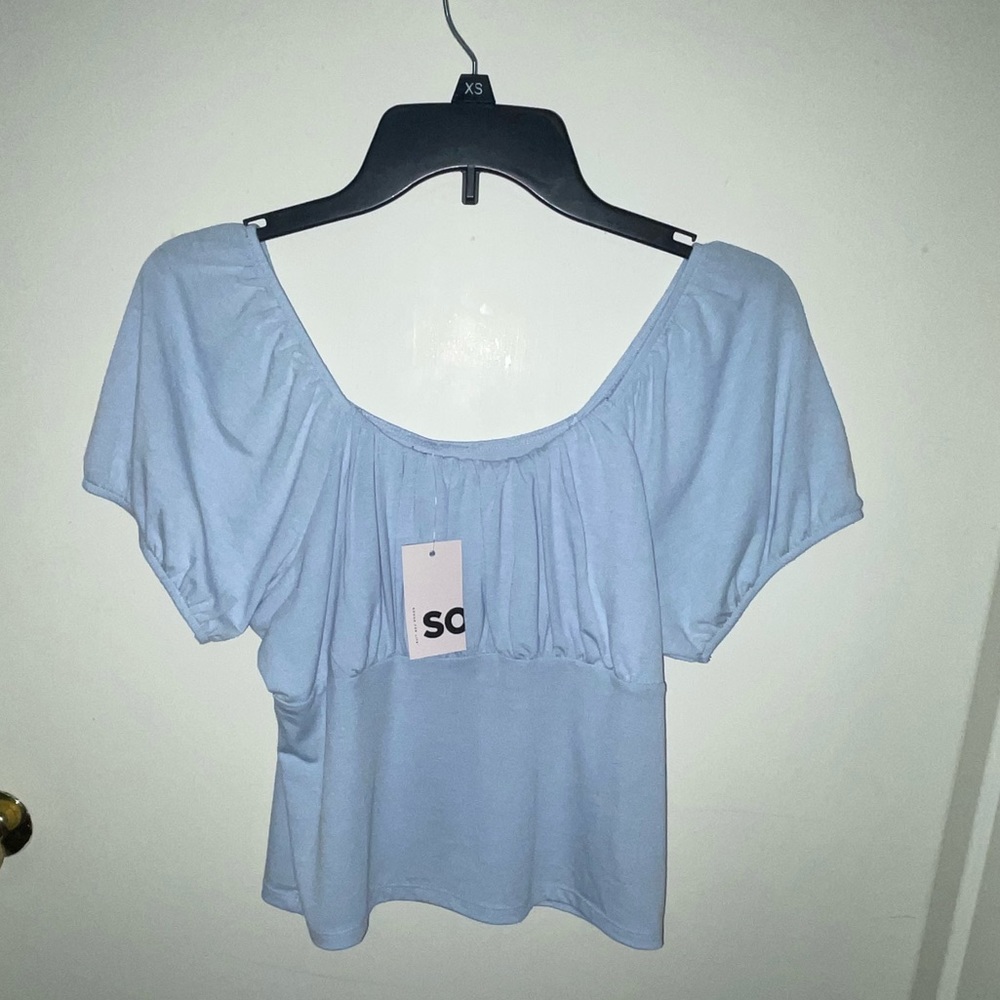 A nice cropped shirt, that hasn’t been worn before!